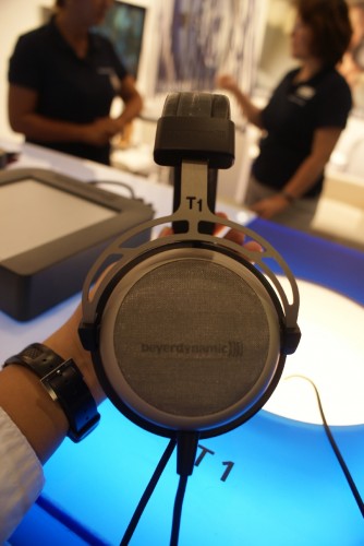 Beyerdynamic T1 - semi-open concept here, and sound doesn't seem "trapped" near your ears.