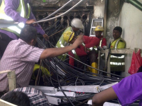 SingTel workers restoring fibre optic network