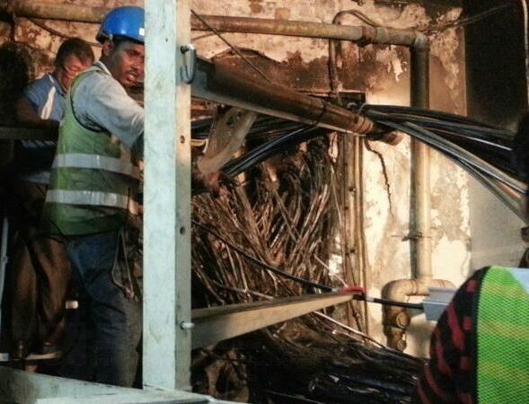singtel workers recovering damaged fibre optic cables