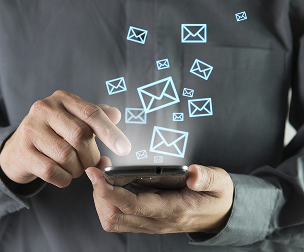 Concept of sending message wireless using smartphone. Source: iStockphoto