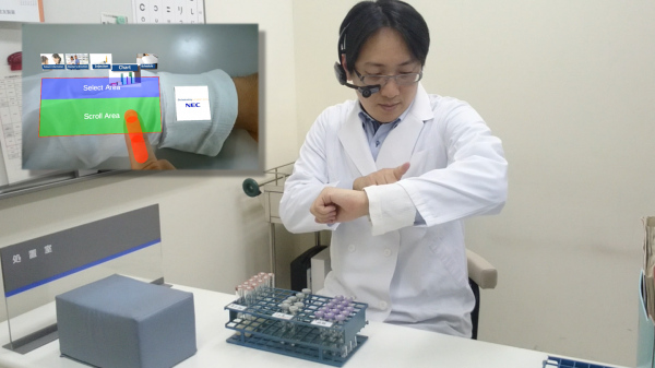 Using a lone pair of smart glasses, the ARmKeypad Air projects a virtual keyboard onto the user's arm.