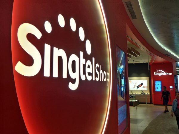 Singtel logo outside a Singtel retail shop in Singapore. PHOTO: Wilson Wong for Techgoondu